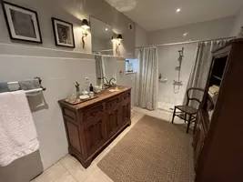 large shower room with toilet