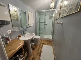 large shower room with toilet