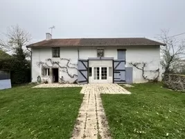 to the right side of the house, entrance to barn/workshop