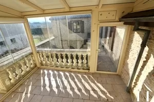 Covered terrace next to kitchen and dining