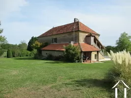 Achterkant hoofdhuis met veranda