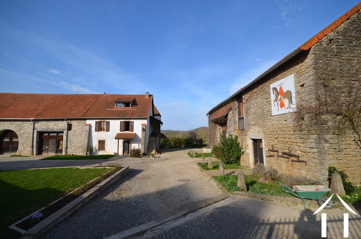 House with apartment and large barns